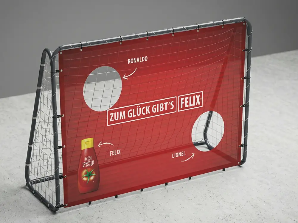 Hochwertige Fußballtore mit vollflächig bedruckter Torwschusswand aus hochwertigem, winddurchlässigem Meshgewebe.